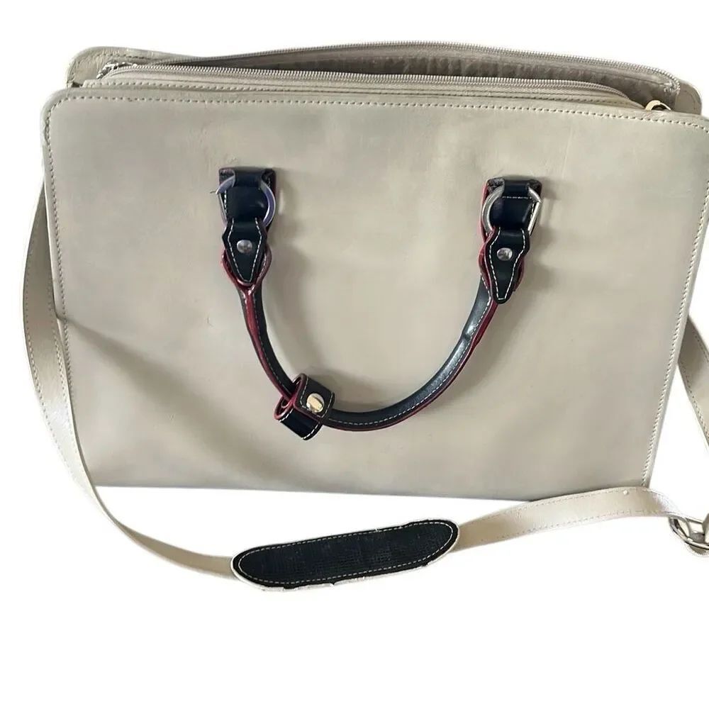 McLein leather computer bag well loved but has lots of life in it small area of